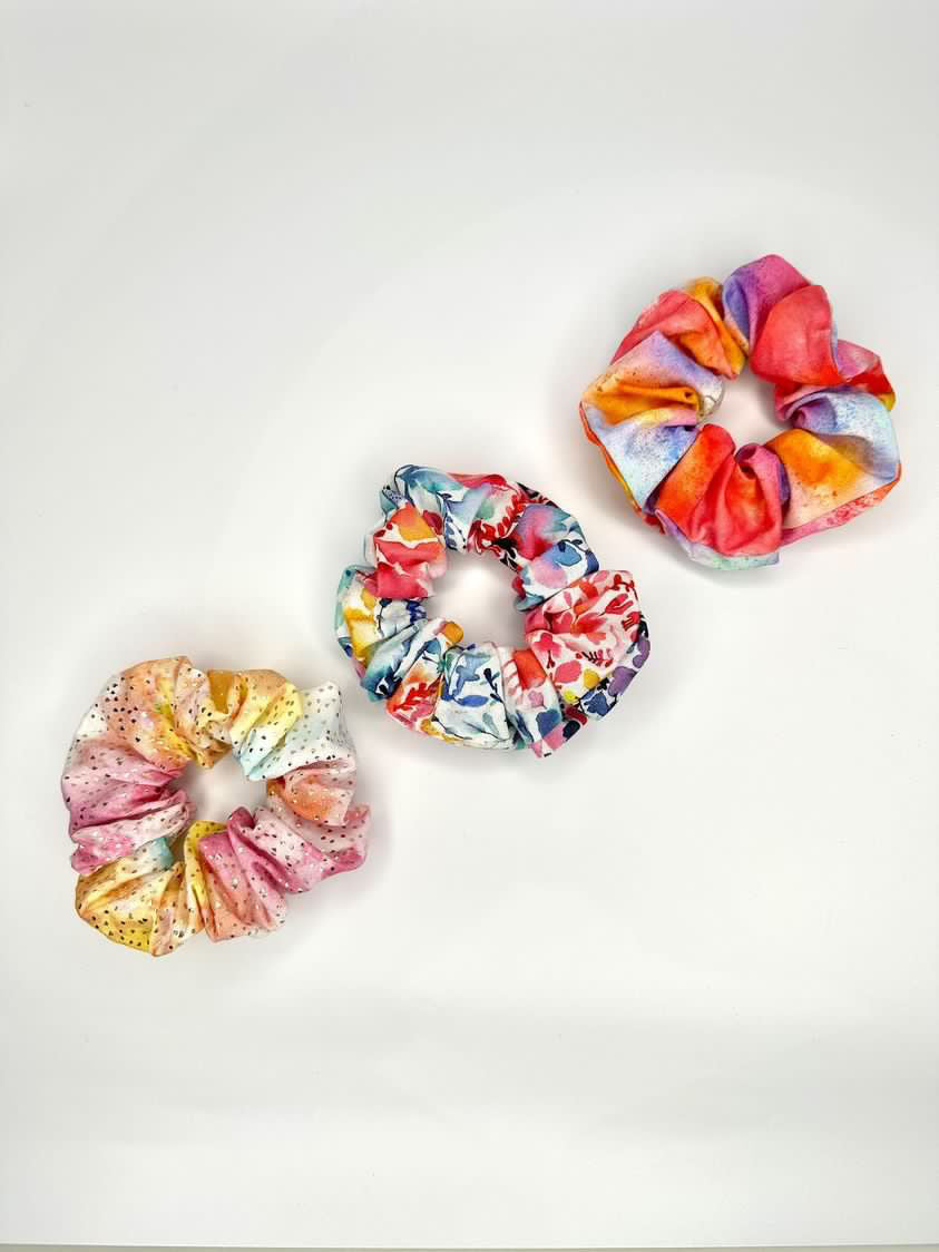 A top view angle of all scrunchies in the collection.