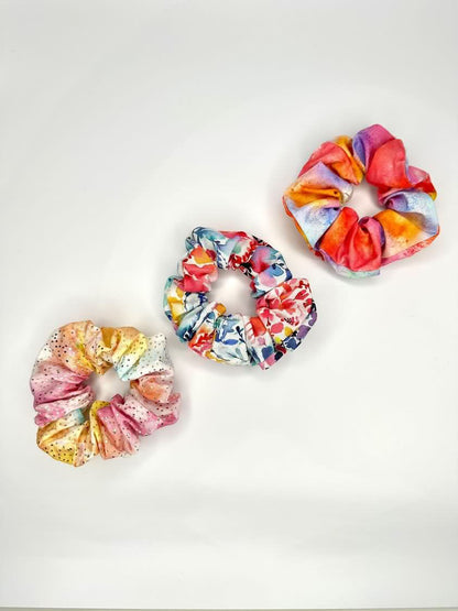 A top view angle of all scrunchies in the collection.